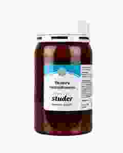 braune dose mit weissem schraubdeckel,blauweisse etikette vorne drauf, granulatmischung in der dose